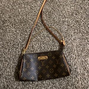 Vintage Authentic Louis Vuitton Eva Clutch bag.